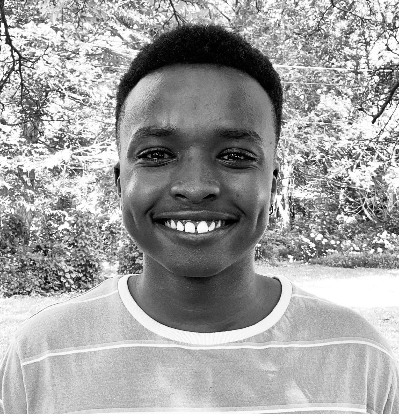 Black and white headshot of Smith outside